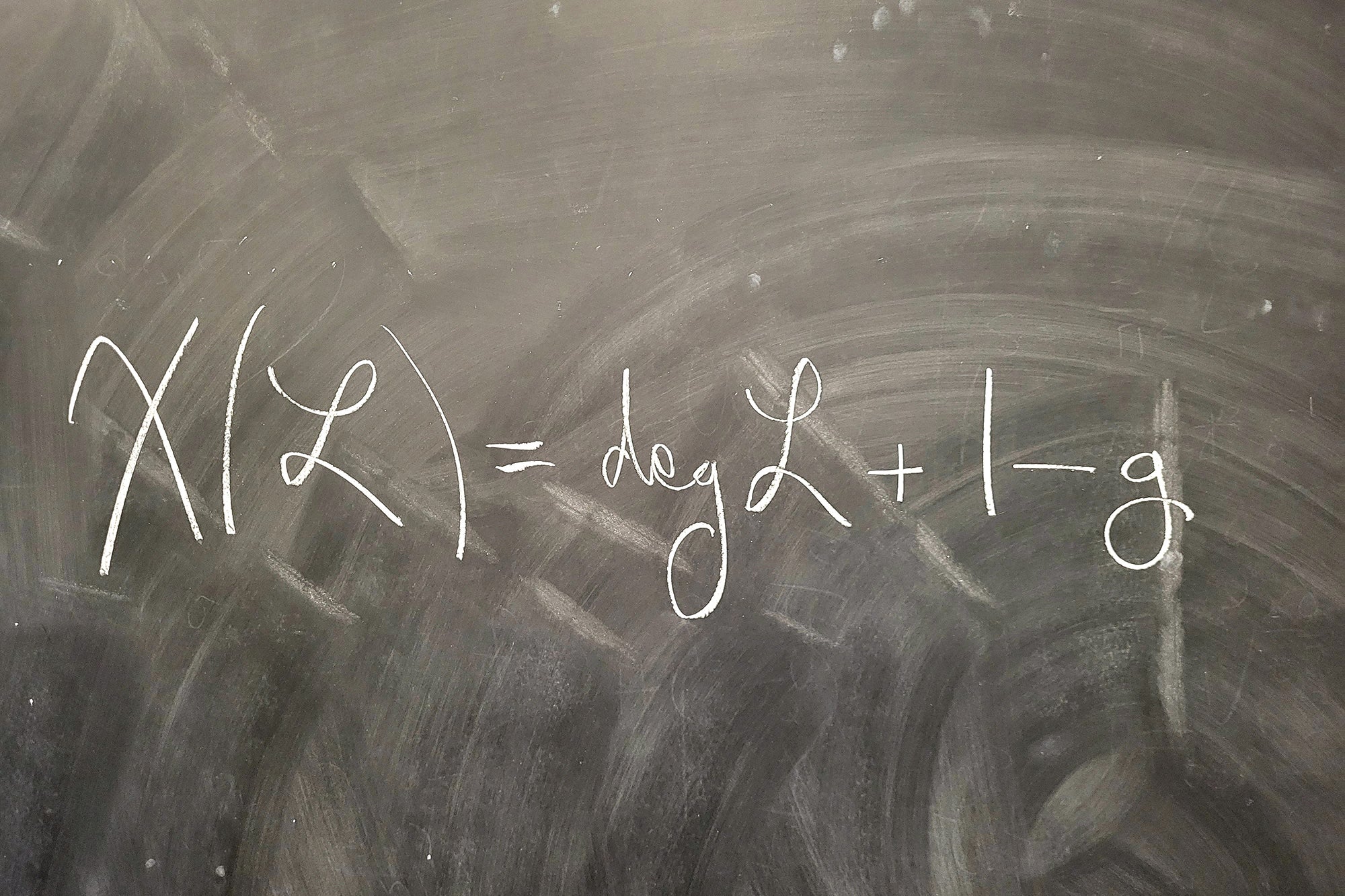 These Are the Most Beautiful Equations in Mathematics 3 Math equation written in white on a black board.